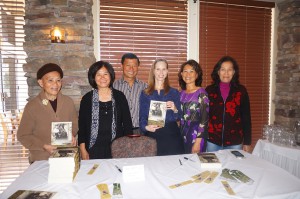 Attending the book talk are some of the people who are in the book, from left, Rose Le, Nancy Hue La, Luong La, Michelle Robin La, Young La Milton, and Lisa Tuyet Le. Rose Le is the mother of Luong, Young, and Nancy while Lisa Tuyet Le is their aunt.