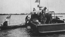 River Patrol Boat stops a small Vietnamese boat. River patrol boat on the Mekong Delta. Photo from the U.S. Navy All Hands magazine July 1969.