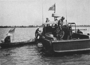 River Patrol Boat stops a small Vietnamese boat. River patrol boat on the Mekong Delta. Photo from the U.S. Navy All Hands magazine July 1969.